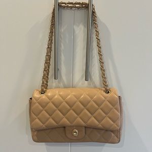 Beige quilted shoulder bag